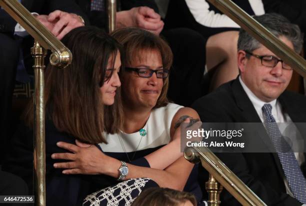 Guest Susan Oliver, widow of slain police officer Danny Oliver, attends a joint session of the U.S. Congress with U.S. President Donald Trump on...