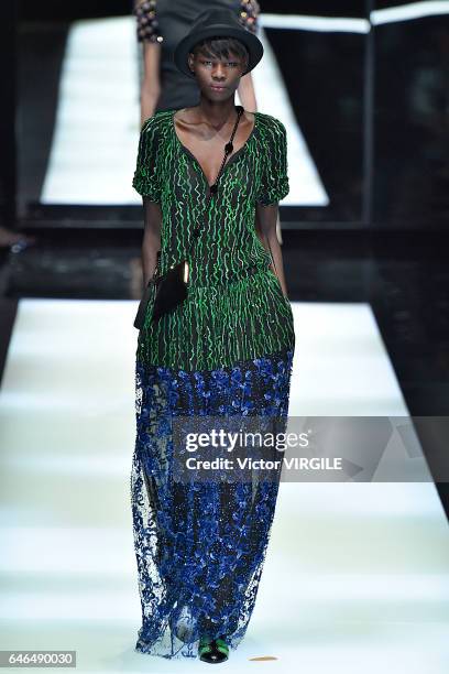 Model walks the runway at the Giorgio Armani Ready to Wear fashion show during Milan Fashion Week Fall/Winter 2017/18 on February 27, 2017 in Milan,...