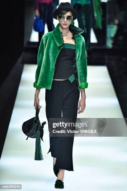 Model walks the runway at the Giorgio Armani Ready to Wear fashion show during Milan Fashion Week Fall/Winter 2017/18 on February 27, 2017 in Milan,...