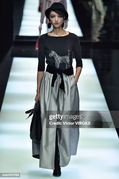 Model walks the runway at the Giorgio Armani Ready to Wear fashion show during Milan Fashion Week Fall/Winter 2017/18 on February 27, 2017 in Milan,...