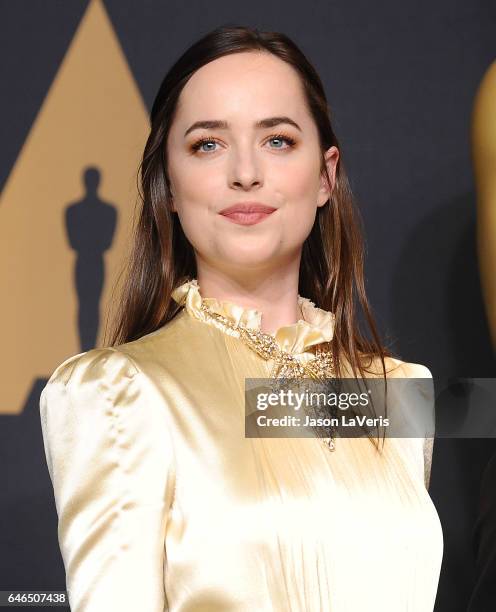 Actress Dakota Johnson poses in the press room at the 89th annual Academy Awards at Hollywood & Highland Center on February 26, 2017 in Hollywood,...