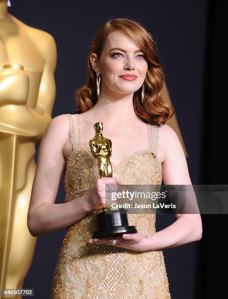 Actress Emma Stone poses in the press room at the 89th annual Academy Awards at Hollywood & Highland Center on February 26, 2017 in Hollywood,...