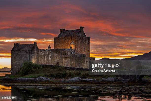 Eilean Donan Castle at sunset in Loch Duich, Ross and Cromarty, Western Highlands of Scotland, UK.