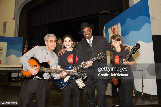 Students pose with Founder of Kids Rock David Wish and Nick Colionne at Chicago Public School Announces Music Program Expansion With Little Kids Rock...