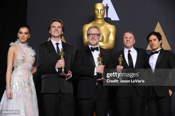 Actor Hailee Steinfeld, co-directors Byron Howard and Rich Moore and producer Clark Spencer, winners of the Best Animated Feature Film award for...