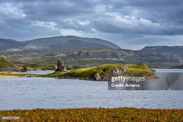 16th century Ardvreck Castle ruins at Loch Assynt in the Highlands at sunset, Sutherland, Scotland, UK.