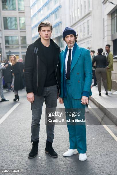 Male models Toby Huntington Whiteley and Richard Biedul on day 2 of London Womens Fashion Week Autumn/Winter 2017, on February 18, 2017 in London,...