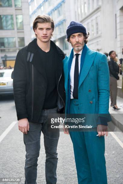 Male models Toby Huntington Whiteley and Richard Biedul on day 2 of London Womens Fashion Week Autumn/Winter 2017, on February 18, 2017 in London,...