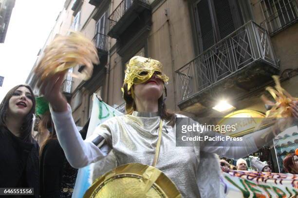 Masked procession in the old part of Naples, in the day of the Mardi Gras parade through the streets of downtown.