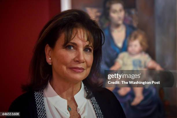 Anne Sinclair, best known as the former wife of French politician Dominique Strauss-Kahn, stands among a newly hung art exhibition of her family's...