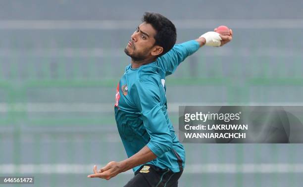 Bangladesh cricketer Mehedi Hasan delivers a ball during a practice session at the R. Premadasa Stadium in Colombo on March 1, 2017 ahead of a Test...