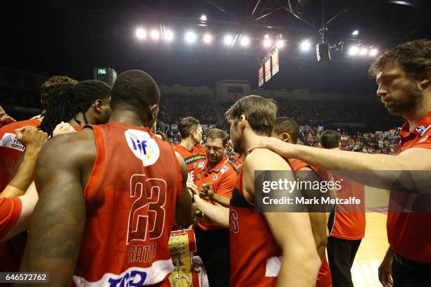 Wildcats coach Trevor Gleeson and players huddle during game two of the NBL Grand Final series between the Perth Wildcats and the Illawarra Hawks at...