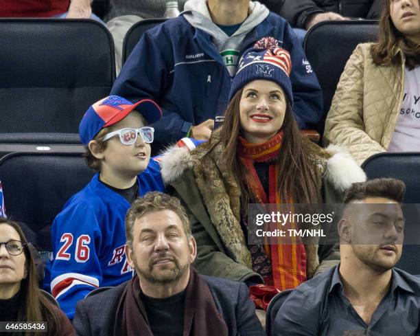 Debra Messing and Roman Walker Zelman are seen at Madison Square Garden on February 28, 2017 in New York City.