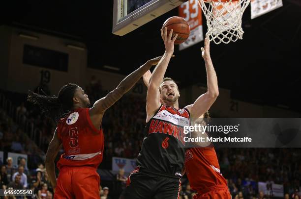 Andrew Ogilvy of the Hawks shoots during game two of the NBL Grand Final series between the Perth Wildcats and the Illawarra Hawks at WIN...