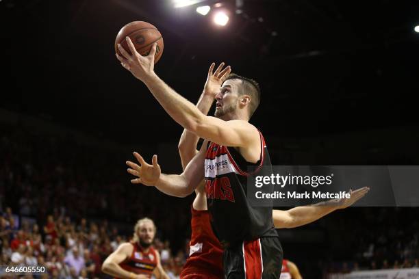 Andrew Ogilvy of the Hawks shoots during game two of the NBL Grand Final series between the Perth Wildcats and the Illawarra Hawks at WIN...