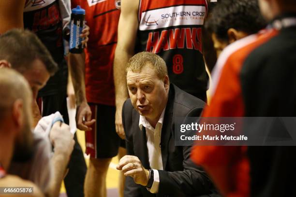 Hawks coach Rob Beveridge talks to players during game two of the NBL Grand Final series between the Perth Wildcats and the Illawarra Hawks at WIN...