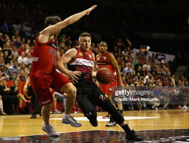 Rotnei Clarke of the Hawks drives to the basket during game two of the NBL Grand Final series between the Perth Wildcats and the Illawarra Hawks at...