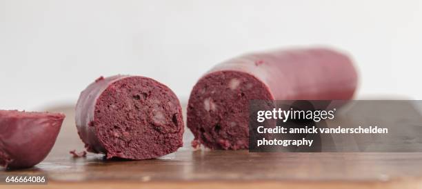 chopped blood sausage. - black pudding stock pictures, royalty-free photos & images