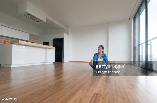 thoughtful woman at an empty apartment - women wearing nothing stock pictures, royalty-free photos & images