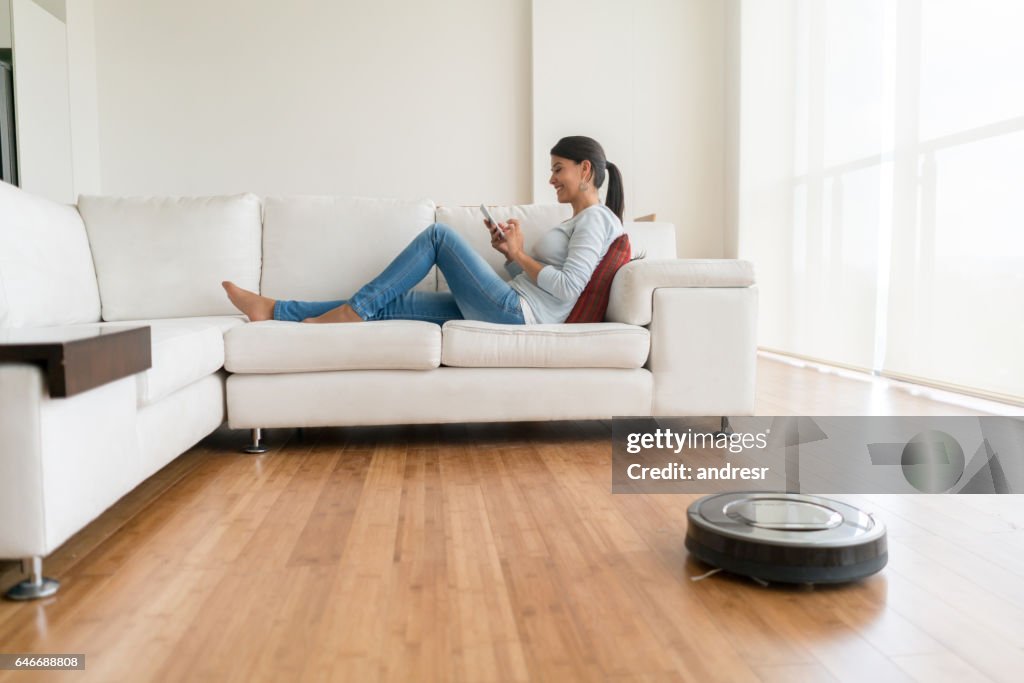 Woman using smart home technologies
