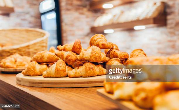 french fresh croissant for sale - french croissant stock pictures, royalty-free photos & images