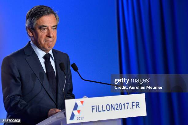 French Candidate for the Right-wing 'Les Republicains' Party, Francois Fillon, gives a press conference to confirm he remains a candidate for the...