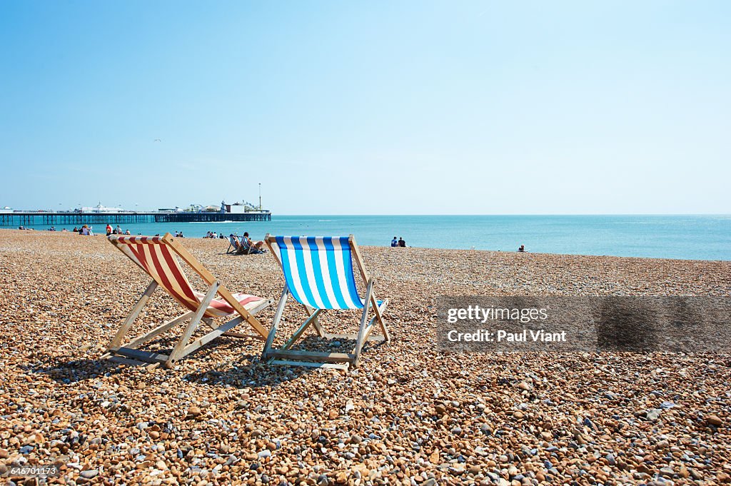 Deck chairs on brighton beach