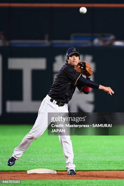 Infielder Tetsuto Yamada of Japan throws to the first base to make a double play in the bottom of the eighth inning during the SAMURAI JAPAN Send-off...