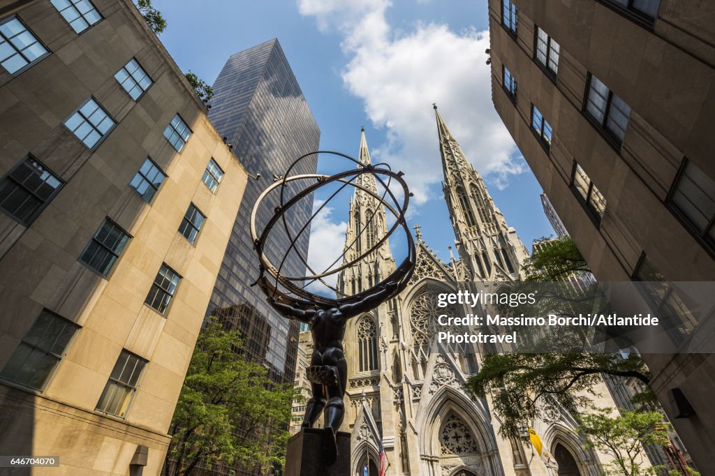 Manhattan, Midtown, Fifth (5th) Avenue, the Atlas Statue of Rockefeller Center and St Patrick Cathedral