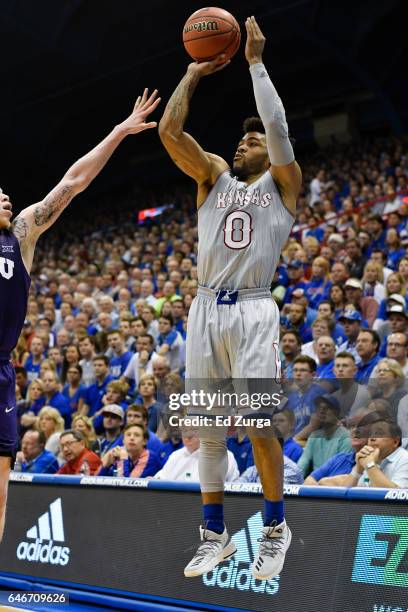 Frank Mason III of the Kansas Jayhawks shoots against the TCU Horned Frogs at Allen Fieldhouse on February 22, 2017 in Lawrence, Kansas.