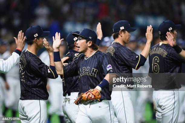 Infielder Nobuhiro Matsuda of Japan celebrates his team's win after the SAMURAI JAPAN Send-off Friendly Match between CPBL Selected Team and Japan at...