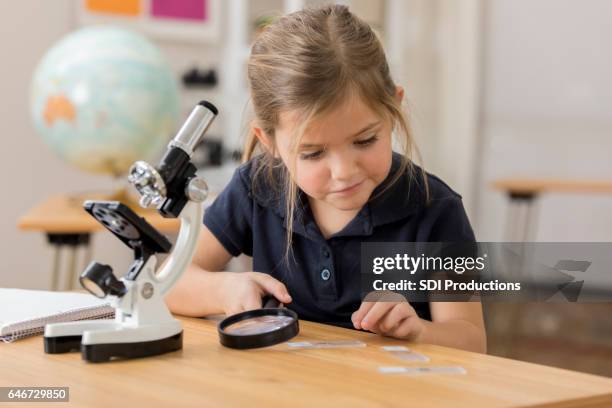 Kid Using Microscope 4,478 Kid Microscope Stock Photos, High-Res Pictures, and Images ...