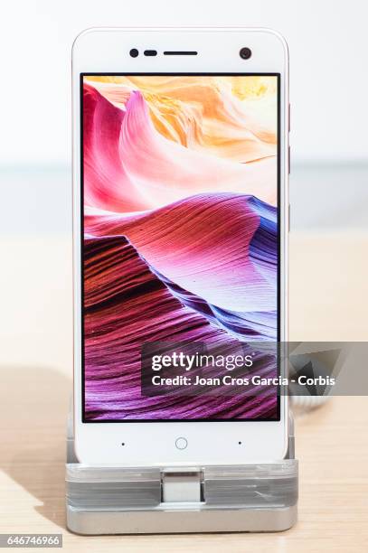 Display their ZTE Blade v8 smartphone, during the Mobile World Congress, on February 28, 2017 in Barcelona, Spain.