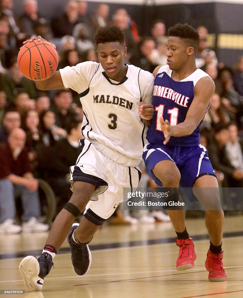 Malden High School's Fern Berard moves on Somerville's Pierre... News