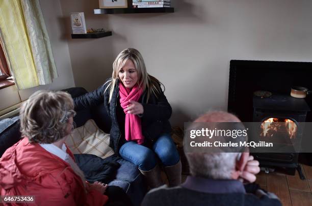 Sinn Fein Northern leader Michelle O'Neill chats to voters on her final day of canvassing before the Stormont elections on March 1, 2017 in...
