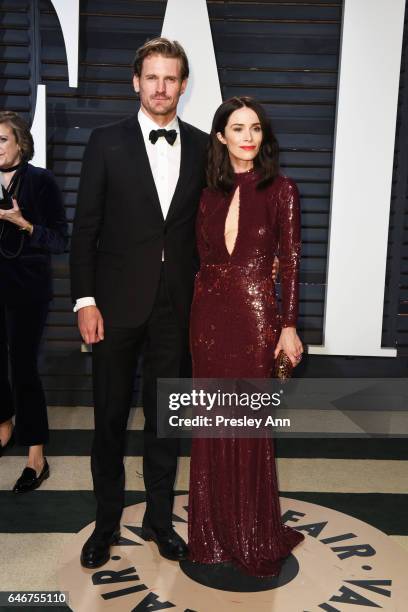 Andrew Pruett and Abigail Spencer attend the 2017 Vanity Fair Oscar Party hosted by Graydon Carter at Wallis Annenberg Center for the Performing Arts...