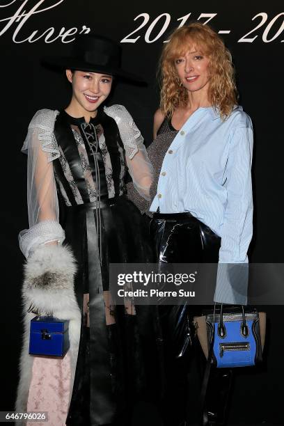 Xuo An Xiao and Elina Halimi attends the Rochas show as part of the Paris Fashion Week Womenswear Fall/Winter 2017/2018 on March 1, 2017 in Paris,...