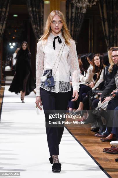 Sasha Pivovarova walks the runway during the Lanvin show as part of the Paris Fashion Week Womenswear Fall/Winter 2017/2018 on March 1, 2017 in...