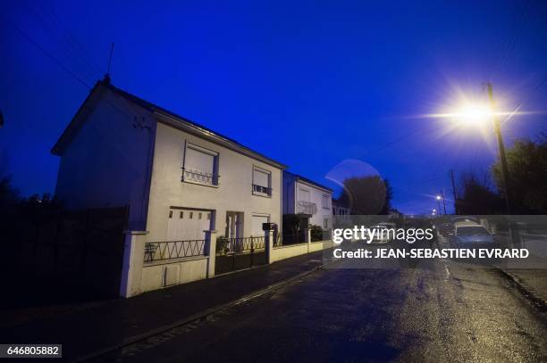 Picture taken on March 1, 2017 in Orvault, near Nantes, shows the house of a family whose members, the parents and their two children aged 18 and 20,...