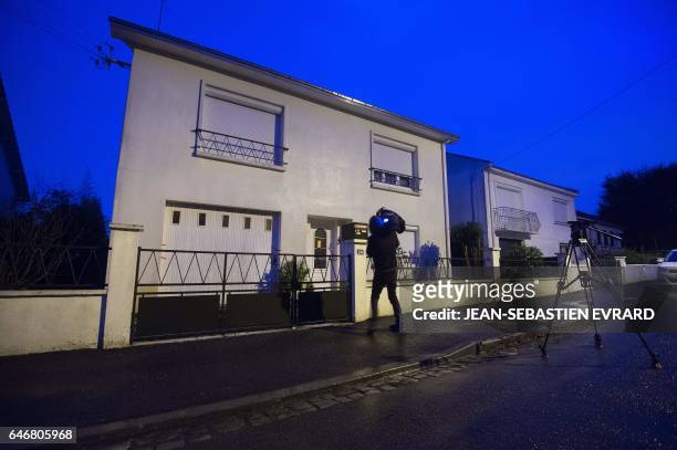 Picture taken on March 1, 2017 in Orvault, near Nantes, shows the house of a family whose members, the parents and their two children aged 18 and 20,...