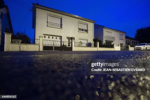 Picture taken on March 1, 2017 in Orvault, near Nantes, shows the house of a family whose members, the parents and their two children aged 18 and 20,...