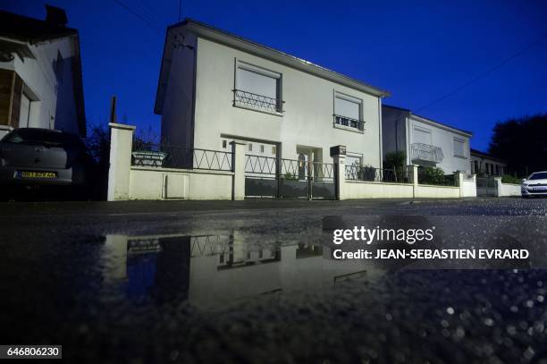 Picture taken on March 1, 2017 in Orvault, near Nantes, shows the house of a family whose members, the parents and their two children aged 18 and 20,...