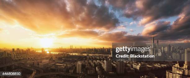 aerial of city of shanghai at sunset looking west - dramatic sky panorama stock pictures, royalty-free photos & images