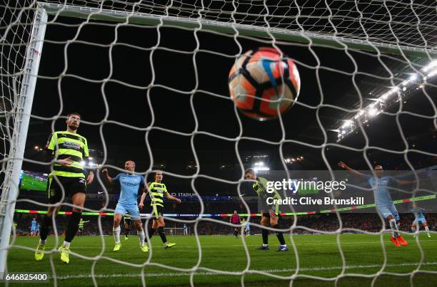 Huddersfield Town players react as Pablo Zabaleta of Manchester City celebrates as he scores their third goal during The Emirates FA Cup Fifth Round...