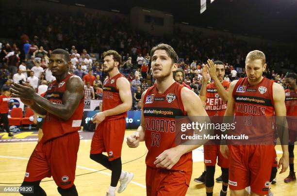 Damian Martin of the Wildcats and team mates celebrate victory in game two of the NBL Grand Final series between the Perth Wildcats and the Illawarra...