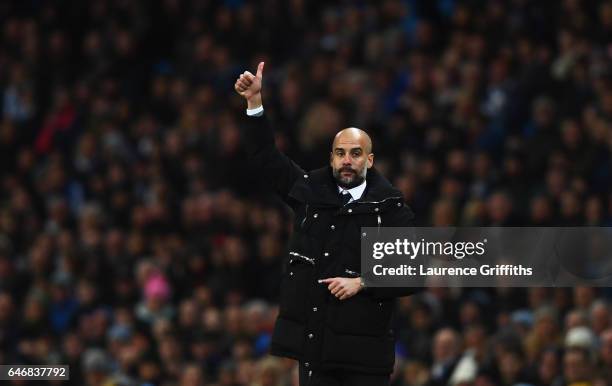 Josep Guardiola manager of Manchester City gives a thumbs up during The Emirates FA Cup Fifth Round Replay match between Manchester City and...