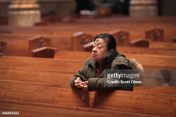 Catholics celebrate Ash Wednesday during a mass at Holy Name Cathedral on March 1, 2017 in Chicago, Illinois. Ash Wednesday, which occurs 46 days...