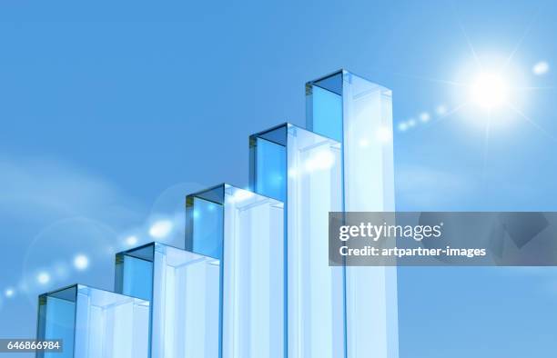 glass pillars forming a bar chart - wachstum stock-fotos und bilder