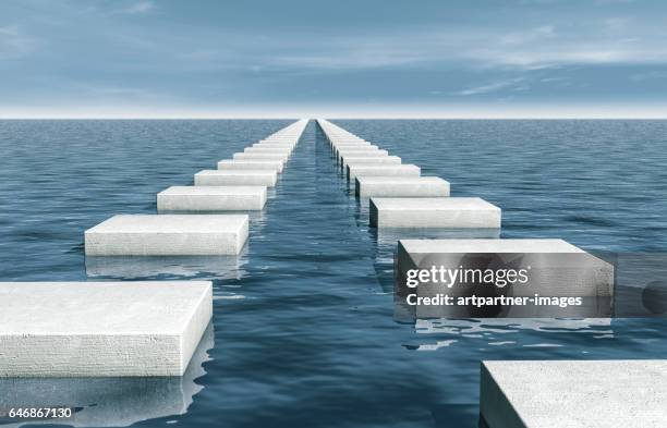 stepping stones in sea - stepping stone stock-fotos und bilder