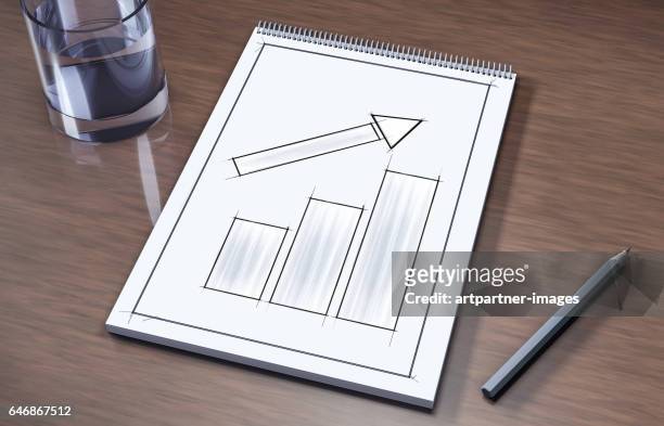 chart lying on a conference table - heidelberg project stock pictures, royalty-free photos & images